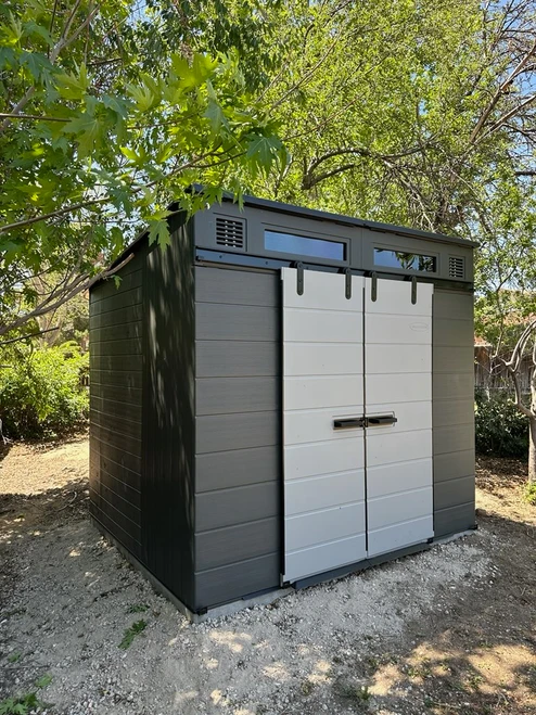 Suncast Modernist® 8x7 Dual Barn Door Storage Shed assembled by a HandyBuddy expert in Lakewood, CO · May 2026