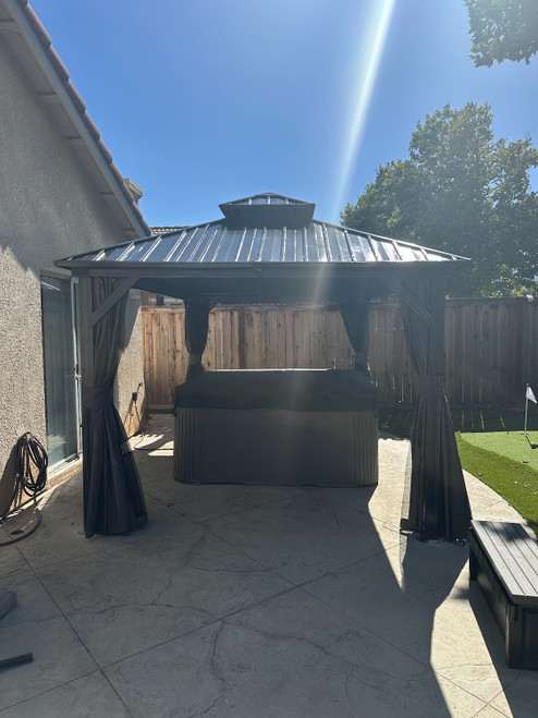 Domi Outdoor Living Hardtop Gazebo with Netting & Curtain installed by a HandyBuddy expert in Corona, CA · Jun 2024