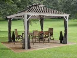 Sojag Messina 12x14 hardtop gazebo with galvanized roof in a landscaped backyard