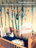 Birch tree wall decals installed behind a wood crib with hanging woodland mobile and contrasting tree colors
