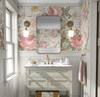 Olena vintage pink flower wallpaper in a bright bathroom with a white vanity and brass sconces