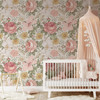 Olena pink garden floral wallpaper in a nursery with a white crib and blush canopy