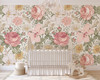 Olena romantic pink floral wallpaper in an elegant nursery with a white crib and crystal chandelier