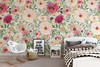 Jessica romantic pink and red flower wallpaper shown on a bedroom accent wall