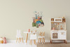 Small watercolor castle mountain wall decal displayed above a white crib in a bright neutral nursery