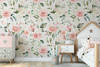 Emily Rose blush pink rose wallpaper in a child’s bedroom with a white house bed and dresser
