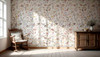 Sunlit room featuring Beatrice Wildflower Wallpaper with delicate meadow flowers