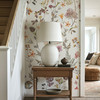 Beatrice Wildflower Wallpaper in a hallway featuring soft watercolor botanical florals