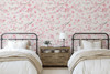 Japanese Inspired Pink Floral Wallpaper With Cherry Blossom Branches in Twin Bedroom