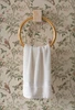 Close Up of Kelsey Bird and Botanical Wallpaper With Brass Towel Ring