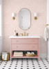 Pink wildflower floral wallpaper with delicate blush floral linework on a warm beige background for nursery bedroom bathroom and romantic cottage interiors