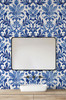 Royal Blue Damask Wallpaper behind a white bathroom vanity with traditional French Country floral pattern