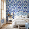 Royal Blue Damask Wallpaper above an upholstered headboard with 26 inch vintage floral repeat