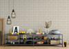 Neutral beige plaid wallpaper in 13 inch repeat styled behind industrial console table with black pendant lights, wood accents, and modern farmhouse decor