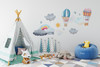 Hot air balloon, moon and cloud wall decals displayed above a play tent in a whimsical children’s playroom