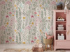 Wild Meadow floral wallpaper in a bright children’s bedroom at the 52-inch pattern scale