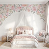 Delaney Irene floral canopy wall decal with soft pink flowers surrounding a canopy bed in a romantic girls bedroom