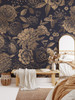 Midnight Botanica dark vintage floral wallpaper in a bedroom dressing area with an arched mirror and wood bench, shown in the 104-inch repeat