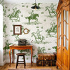 Weathered Green Cowboy Wallpaper styled in an entryway with wood table, framed art, vintage trunk, warm wood door, and rustic Western rodeo wall decor
