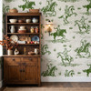 Weathered Green Cowboy Wallpaper styled with vintage wood hutch, pottery, books, dried flowers, and rustic Western farmhouse wall decor