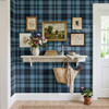 Blue Tartan Plaid wallpaper styled in an entryway with console table, flowers, framed art, wall shelf, window, and classic farmhouse plaid decor 