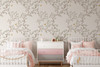 Chinoiserie wallpaper with woodland branches and butterflies in a soft nursery