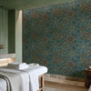 Dimensional dark floral wallpaper styled in an elegant living room with modern furnishings