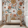 Baby room with Boho Garden wallpaper and natural wood nursery decor