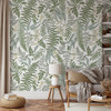 Galli botanical wallpaper in a cozy living room with oversized fern and foliage design