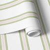 Close-up wallpaper sample showing Charlotte Stripe sage green and blush pink stripe pattern