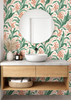 Scandinavian cottage wallpaper with green leaves and coral flowers in a bathroom