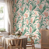 Green and coral floral wallpaper in a dining room with cottage style decor