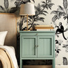 Luxury bedroom featuring Margot Tropical Toile Wallpaper with vintage monkeys and palm trees