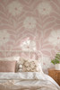 Bethany pink abstract floral wallpaper in a modern nursery featuring oversized blush botanical flowers