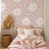 Bethany pink abstract floral wallpaper in a modern nursery featuring oversized blush botanical flowers