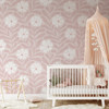 Bethany pink abstract floral wallpaper in a modern nursery featuring oversized blush botanical flowers