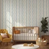 Elsie Heritage Blue floral stripe wallpaper in 26 inch repeat styled in a nursery with wood crib, mustard chair, woven baskets, and soft English cottage decor