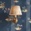 Fruit Compote Navy Blue retro dining room wallpaper in 52 inch repeat shown close up with bronze wall sconce and oversized vintage fruit bowl pattern