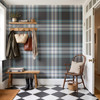 Navy teal plaid wallpaper in a mudroom entryway with wall hooks, bench, black and white floor, and rustic decor 52 REPEAT