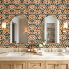 Alderley Tulip Wallpaper in a bathroom with double arched mirrors, cream vanity, and vintage botanical style