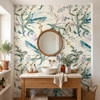 Eden Watercolor Floral Wallpaper styled in a spa bathroom with round wood mirror, natural wood vanity, vessel sink, and large watercolor floral wall pattern
