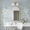 Misty blue chinoiserie mural wallpaper wrapped around an elegant bathroom