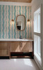 Elsie Aquamarine light teal floral stripe wallpaper above a natural wood vanity in a modern bathroom, 52 inch repeat