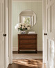 Elsie Ivory Mint Green Wallpaper in Bright Entryway With Vintage Dresser and Flowers
