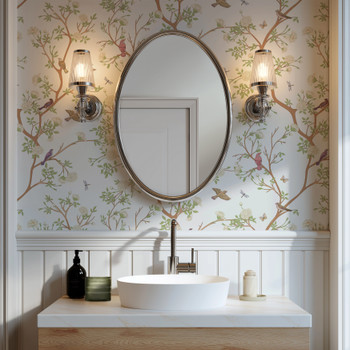 Selina Chinoiserie floral bird wallpaper in a classic bathroom with oval mirror, wall sconces, and white vanity 26 repeat