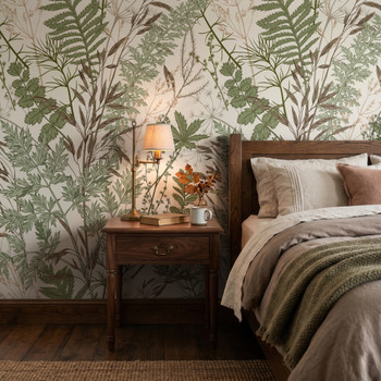 Oversized fern and meadow grass wallpaper in a masculine bedroom with dark wood furniture and neutral bedding