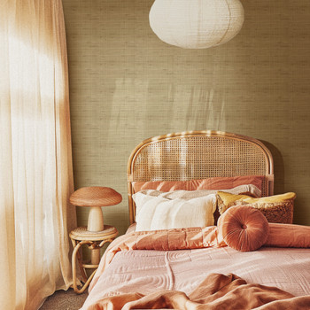 faux grasscloth wallpaper in toasted straw color featured in a warm neutral bedroom