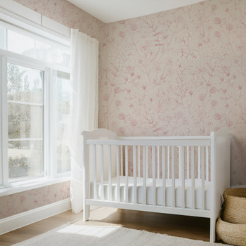 Pink wildflower floral wallpaper with delicate blush floral linework on a warm beige background for nursery bedroom bathroom and romantic cottage interiors