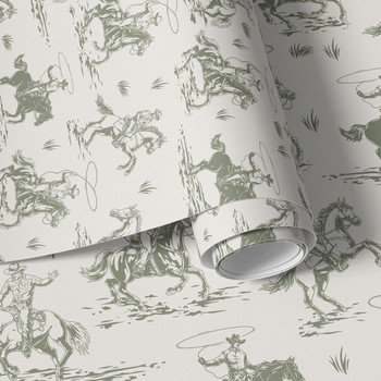 Sage green cowboy wallpaper with vintage western horses and riders on a beige background for nursery, boys room or farmhouse decor