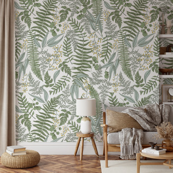 Galli botanical wallpaper in a cozy living room with oversized fern and foliage design